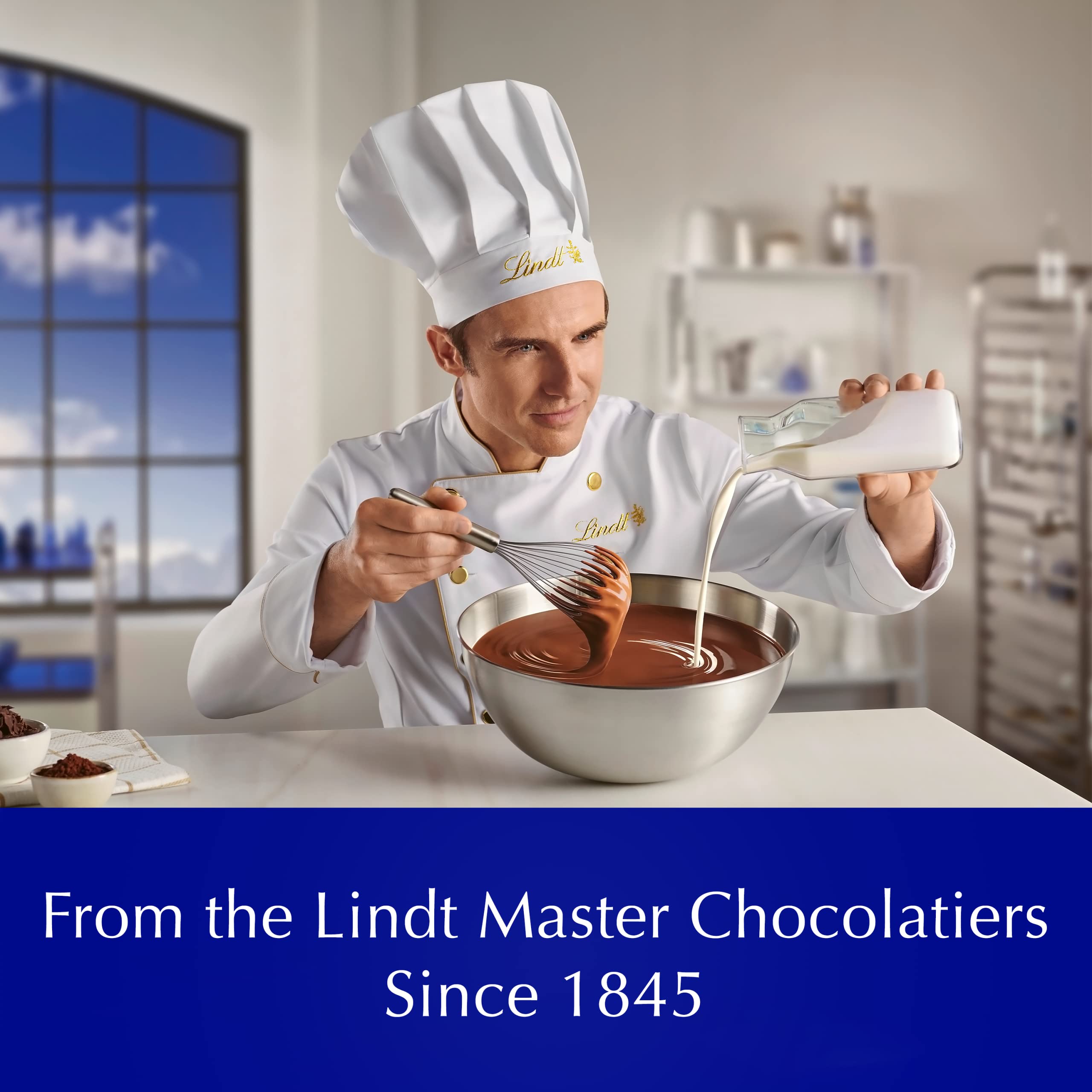 Lindt LINDOR White Chocolate Peppermint Truffles, White Chocolate Candy with Smooth Peppermint Truffle Center, 25.4 oz., 60 Count